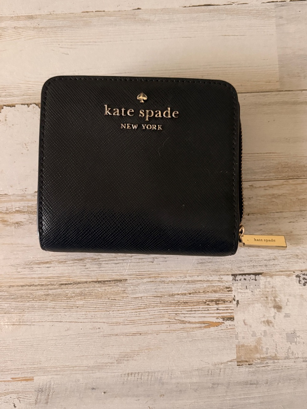kate spade Black Leather Zip Around Wallet with Gold Logo
